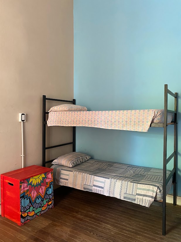 Cama en habitación compartida mixta